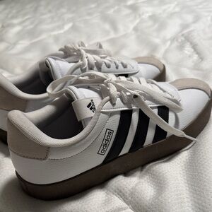 Adidas women’s White and Black Sneakers with Tan Accents